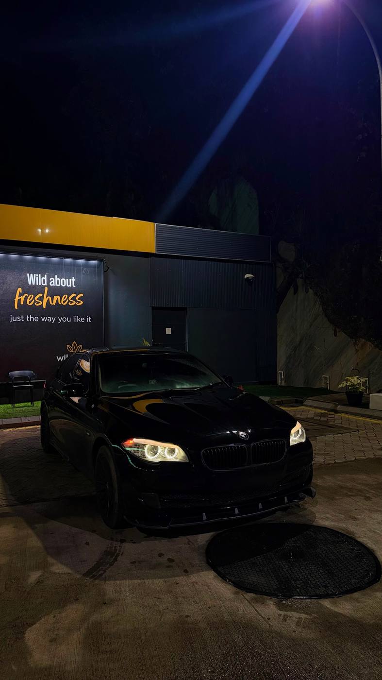 BMW 520d at a fuel station