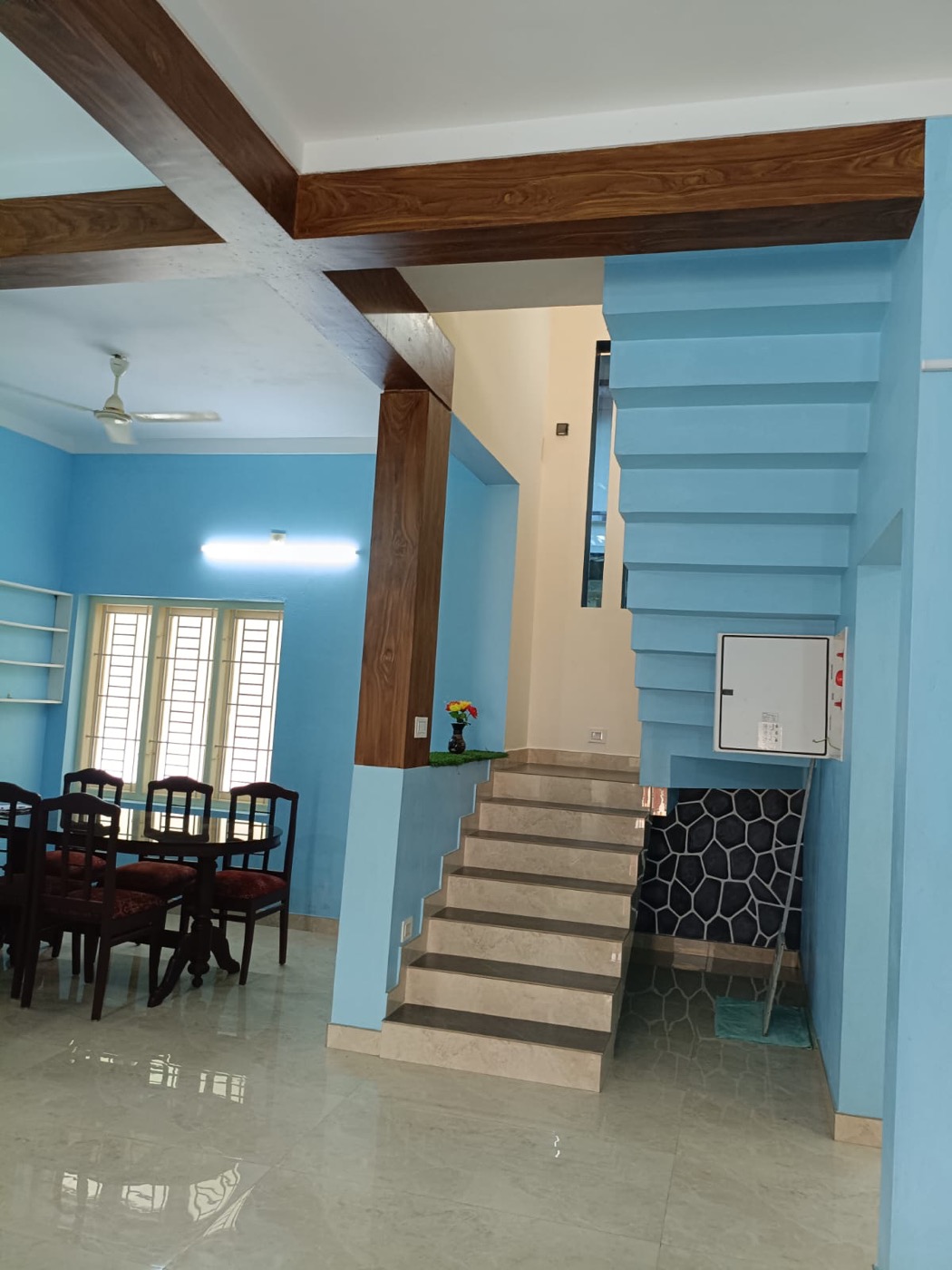 Dining area with open staircase