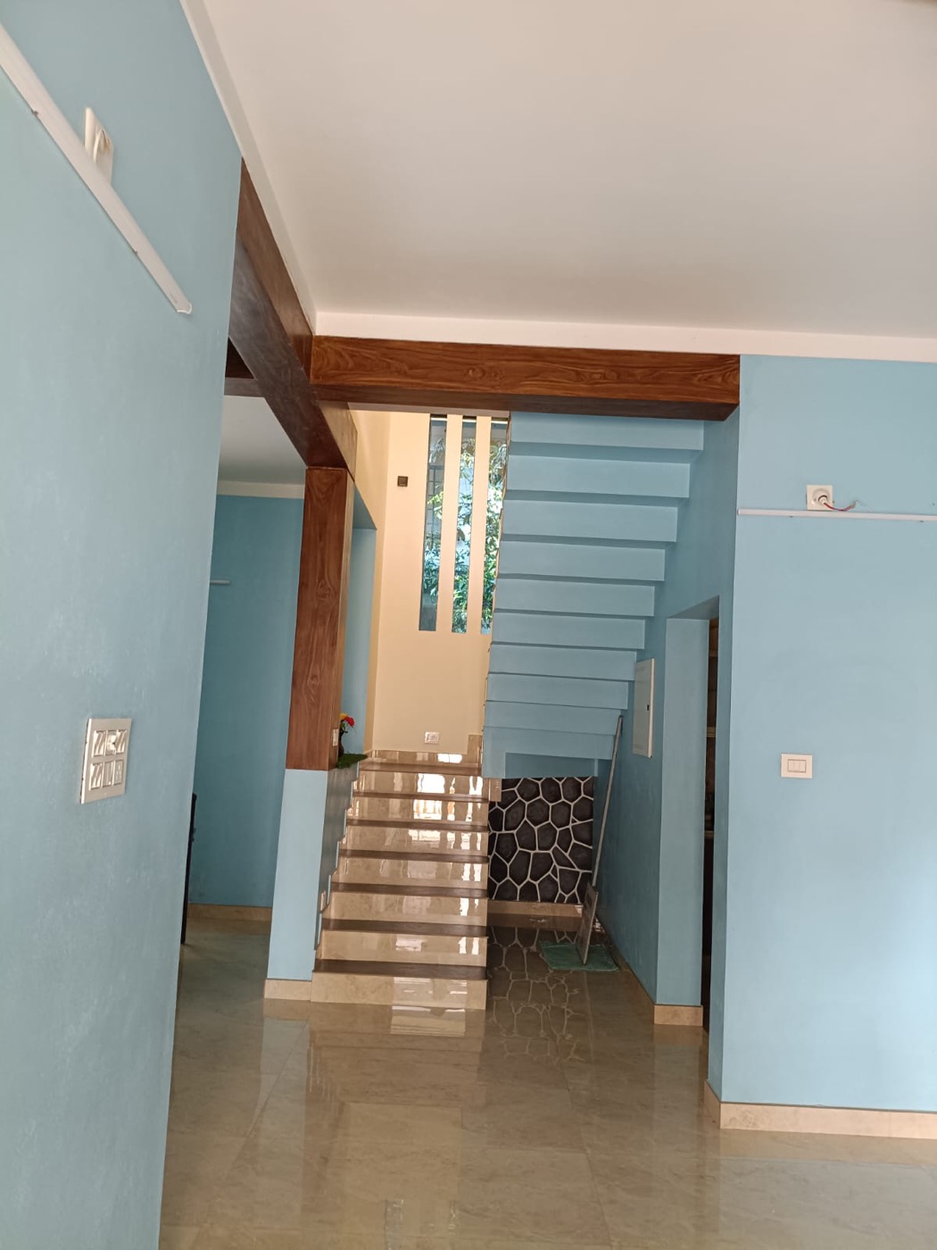 Bright entrance hall and staircase