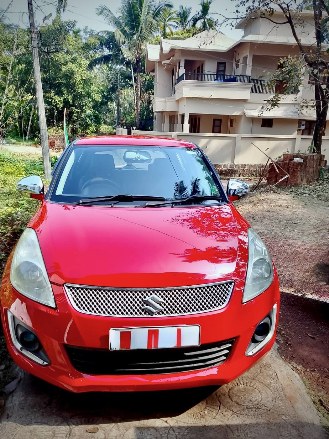 Maruti Suzuki Swift VXI red front view