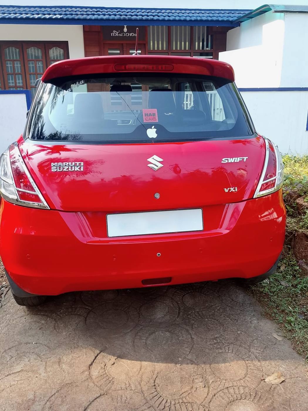 Maruti Suzuki Swift red rear view